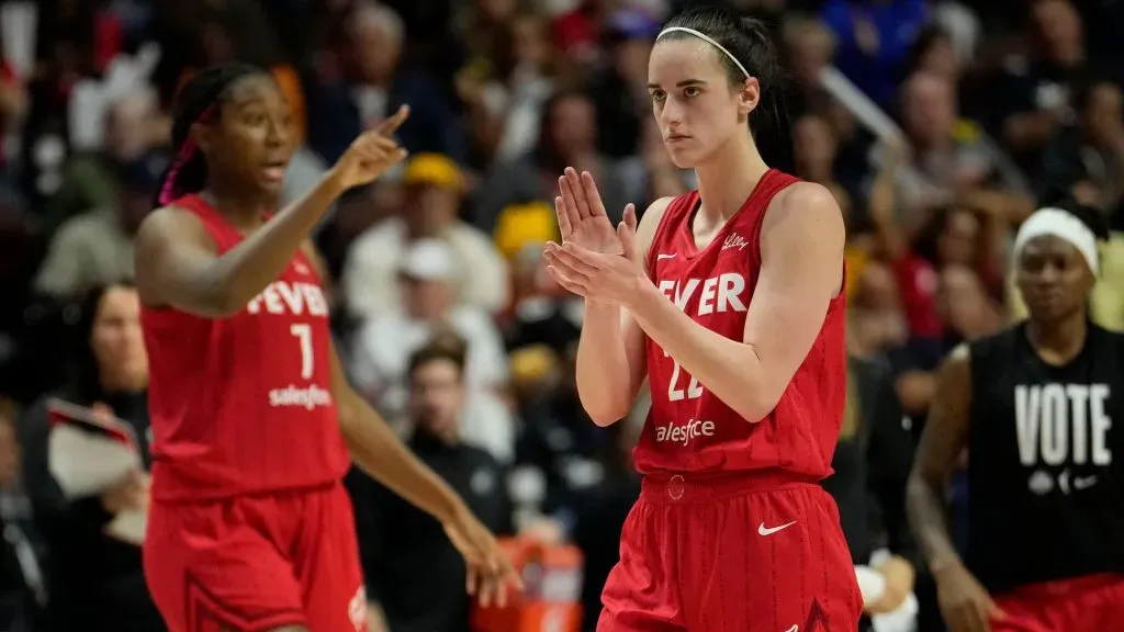 Aliyah Boston #7 and Caitlin Clark #22 of the Indiana Fever reacts as they play the Connecticut Sun during the fourth quarter of Game Two of the 2024 WNBA Playoffs first round in 2024. (Source: Joe Buglewicz/Getty Images)