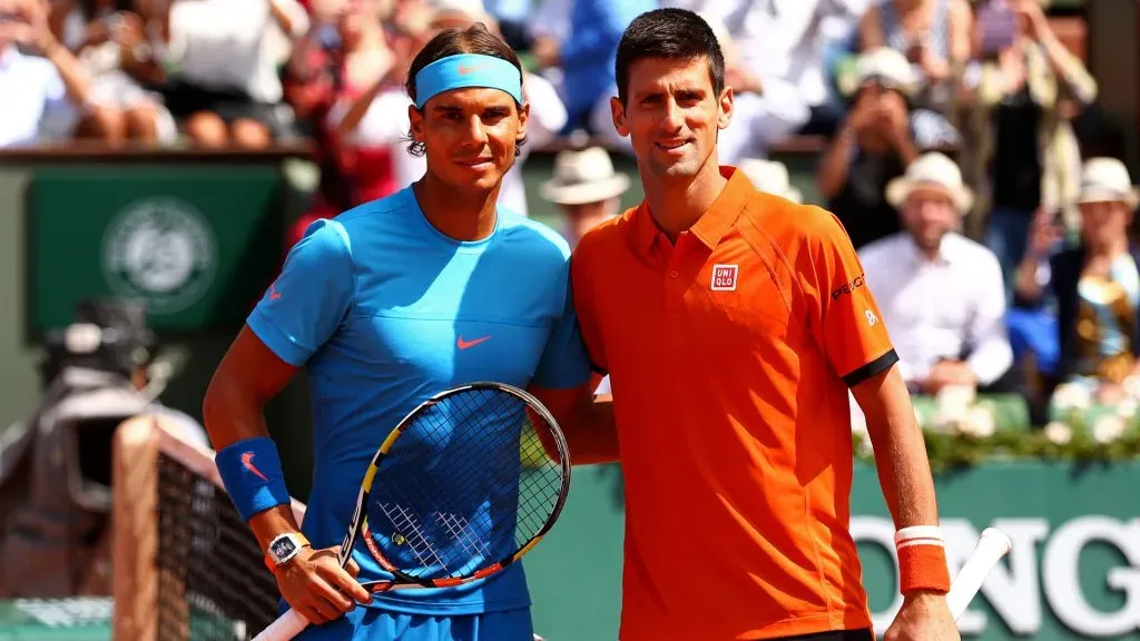 Rafael Nadal of Spain and Novak Djokovic of Serbia pose at the net before their quarter final match on day eleven of the 2015 French Open at Roland Garros. (Clive Brunskill/Getty Images)