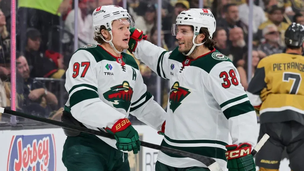 Kirill Kaprizov #97 and Ryan Hartman #38 of the Minnesota Wild celebrate Kaprizov’s first-period power-play goal against the Vegas Golden Knights in Game Five of the First Round of the 2025 Stanley Cup Playoffs at T-Mobile Arena on April 29, 2025 in Las Vegas, Nevada. (Photo by Ethan Miller/Getty Images)