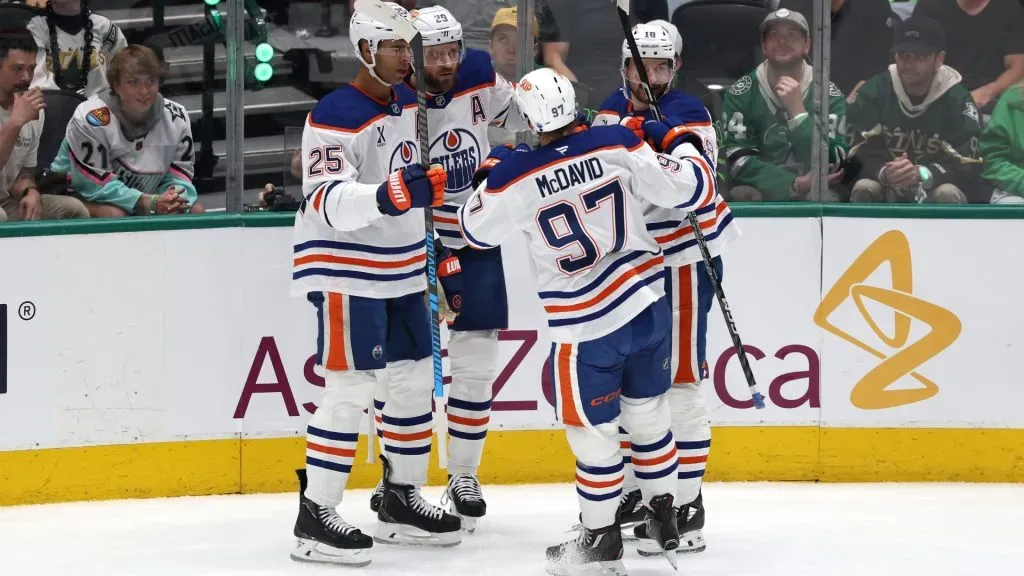 Leon Draisaitl #29 of the Edmonton Oilers is congratulated by his teammates after scoring a goal against the Dallas Stars during the first period in Game One of the Western Conference Final of the 2025 Stanley Cup Playoffs at American Airlines Center on May 21, 2025 in Dallas, Texas. (Photo by Stacy Revere/Getty Images)