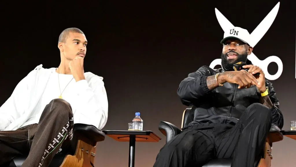 Victor Wembanyama and LeBron James speak onstage during Fanatics Fest NYC 2025