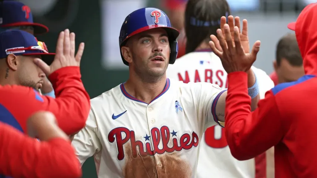 Otto Kemp #4 of the Philadelphia Phillies high-fives teammates in the dugout after scoring a run in the third inning during a game against the Toronto Blue Jays at Citizens Bank Park on June 15, 2025 in Philadelphia, Pennsylvania. (Photo by Hunter Martin/Getty Images)