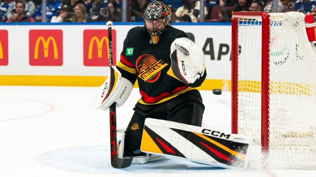 The puck rebounds off the post and back into goalie Thatcher Demo #35 of the Vancouver Canucks during the first period in NHL action against the Anaheim Ducks on April, 5, 2025 at Rogers Arena in Vancouver, British Columbia, Canada. (Photo by Rich Lam/Getty Images)