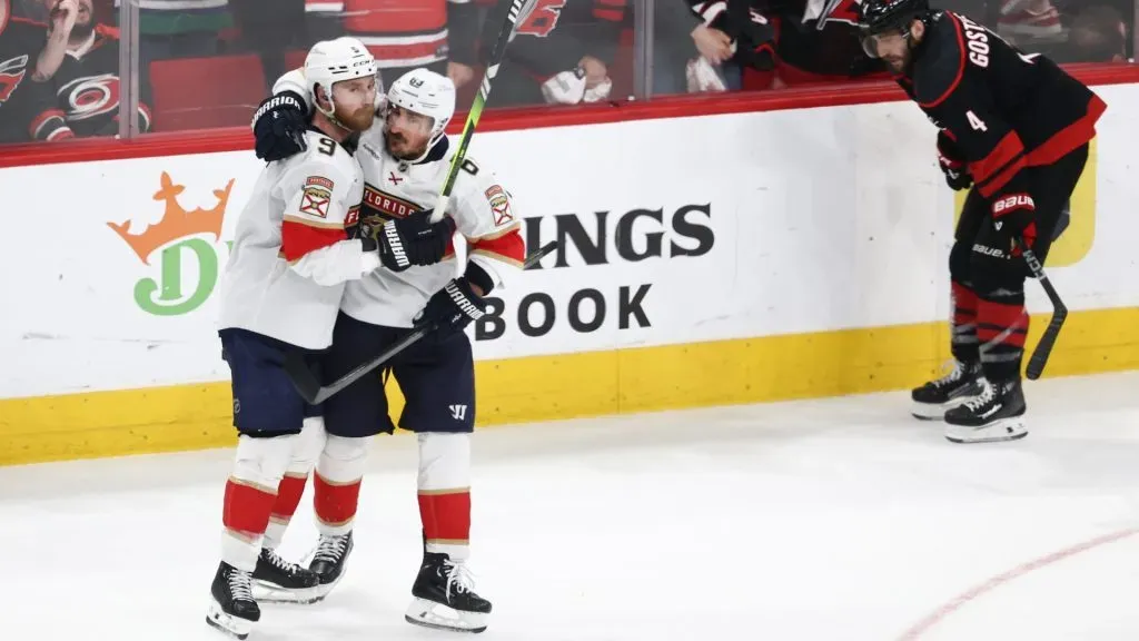 Sam Bennett #9 of the Florida Panthers celebrates with Brad Marchand #63 after scoring a goal against the Carolina Hurricanes during the third period in Game Five of the Eastern Conference Final of the 2025 Stanley Cup Playoffs at Lenovo Center on May 28, 2025 in Raleigh, North Carolina. (Photo by Jared C. Tilton/Getty Images)