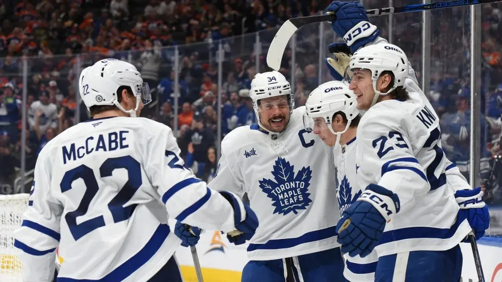 Jake McCabe #22, Auston Matthews #34, Mitch Marner #16 and Auston Matthews #34 of the Toronto Maple Leafs celebrate a third-period goal against the Edmonton Oilers during the game at Rogers Place on February 1, 2025, in Edmonton, Alberta, Canada. (Photo by Leila Devlin/Getty Images)