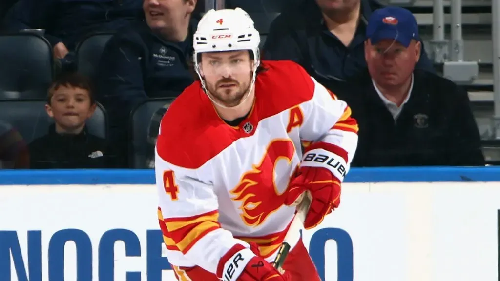 Rasmus Andersson #4 of the Calgary Flames skates against the New York Islanders at UBS Arena on March 22, 2025 in Elmont, New York. (Photo by Bruce Bennett/Getty Images)
