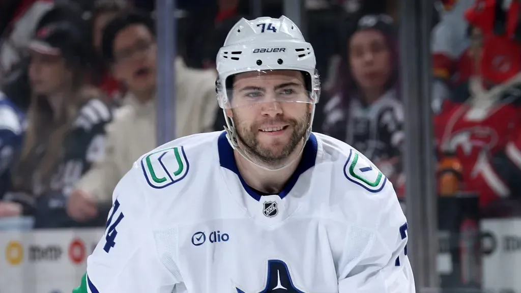 Jake DeBrusk #74 of the Vancouver Canucks reacts to teammate Pius Suter&#039;s goal during the first period against the New Jersey Devils at Prudential Center on March 24, 2025 in Newark, New Jersey. 