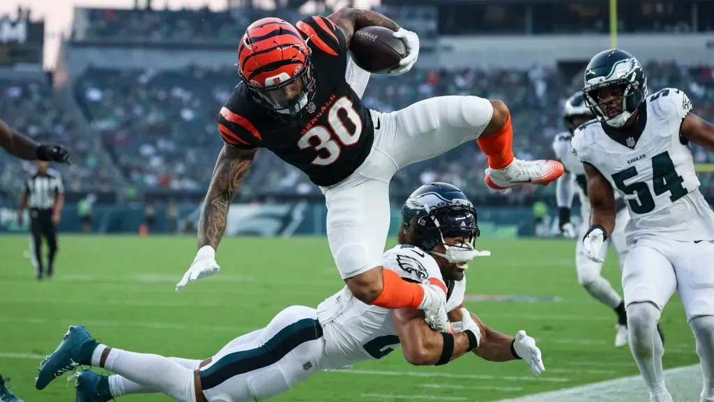 Chase Brown #30 of the Cincinnati Bengals is tackled by Sydney Brown #21 of the Philadelphia Eagles during the first half of the NFL Preseason 2025 game. (Source: Scott Taetsch/Getty Images)