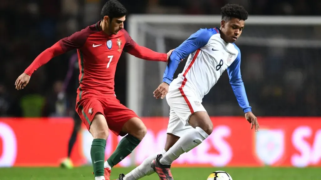 Gonçalo Guedes of Portugal competes for the ball with Weston McKennie of USA during a friendly game in 2017. (Octavio Passos/Getty Images)