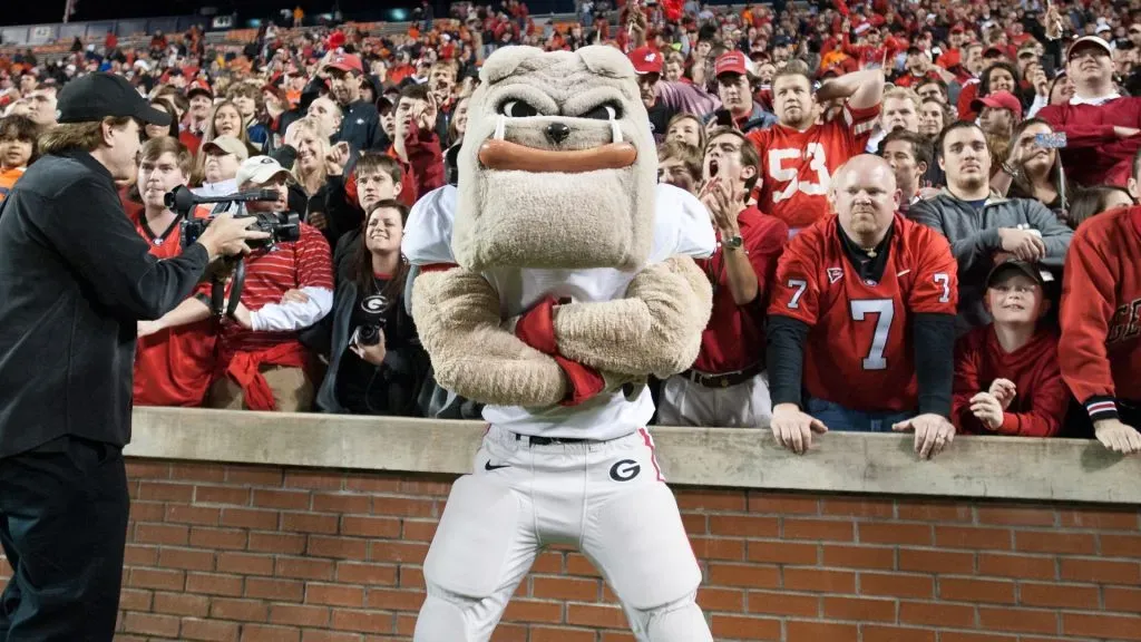 Georgia’s mascot poses in front of Georgia Bulldog fans after their game. (Source: Michael Chang/Getty Images)