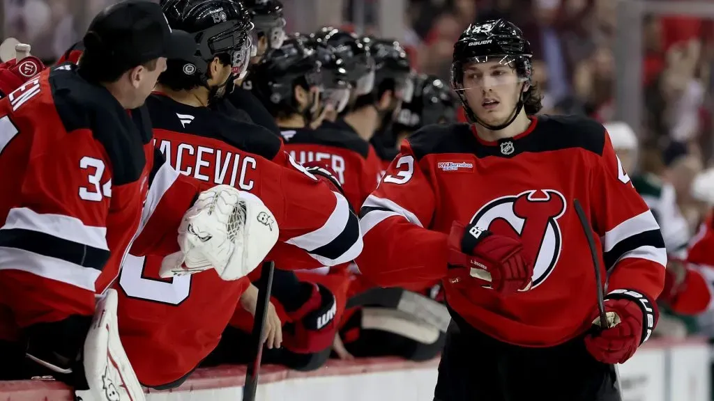 Luke Hughes #43 of the New Jersey Devils celebrates his goal with teammates. (Photo by Elsa/Getty Images)