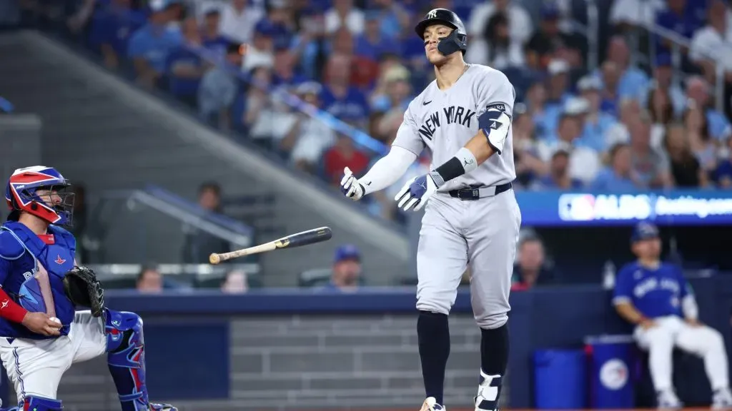 Aaron Judge #99 of the New York Yankees tosses his bat during the ninth inning in game two of the American League Division Series. (Photo by Vaughn Ridley/Getty Images)