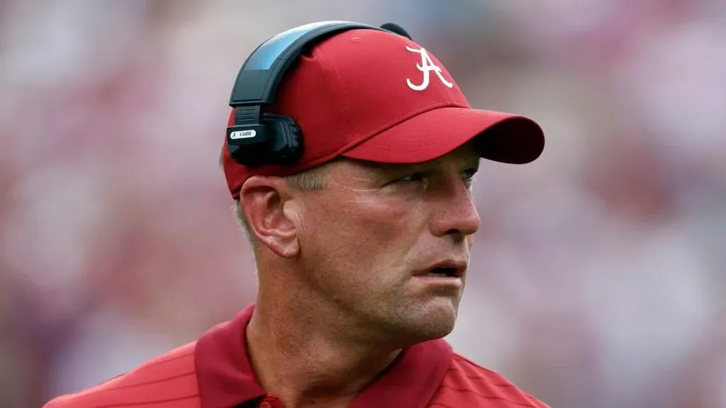 Kalen DeBoer looks to his side