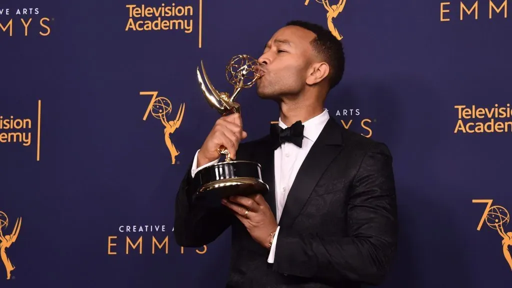 John Legend poses with his Emmy ( Alberto E. Rodriguez/Getty Images)