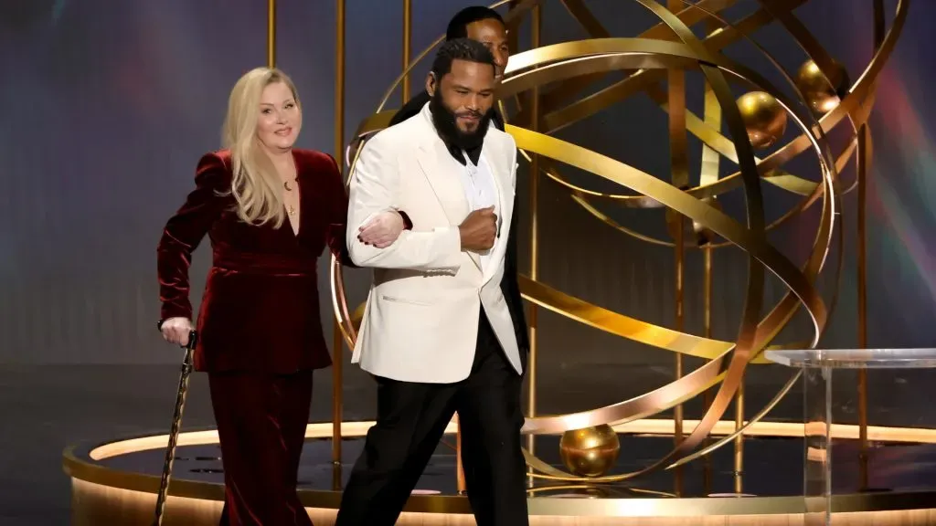Christina Applegate and host Anthony Anderson speak onstage during the 75th Primetime Emmy Awards. (Source: Kevin Winter/Getty Images)