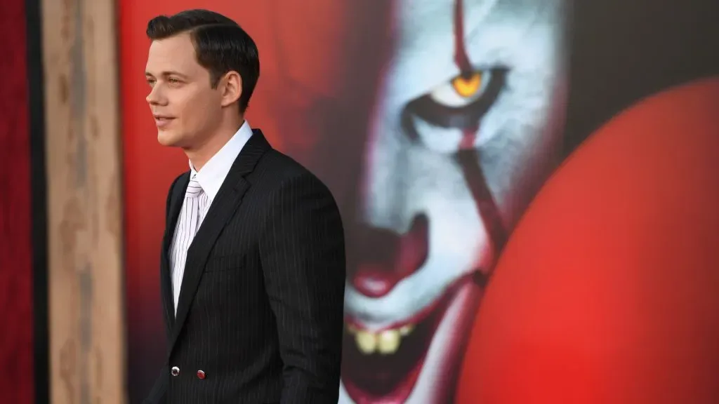 Bill Skarsgård at an event for It Chapter Two. (Source: IMDb and Robyn Beck/AFP via Getty Images)