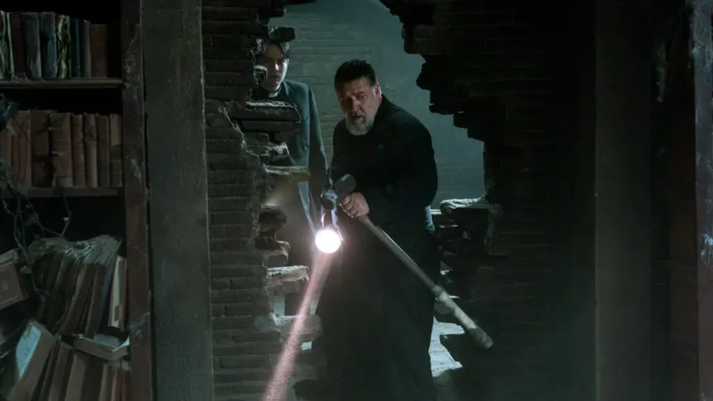 Russell Crowe and Daniel Zovatto in The Pope’s Exorcist. (Source: IMDb)