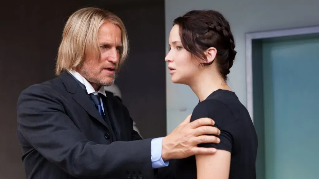 Woody Harrelson and Jennifer Lawrence in “The Hunger Games.” (Source: IMDb)