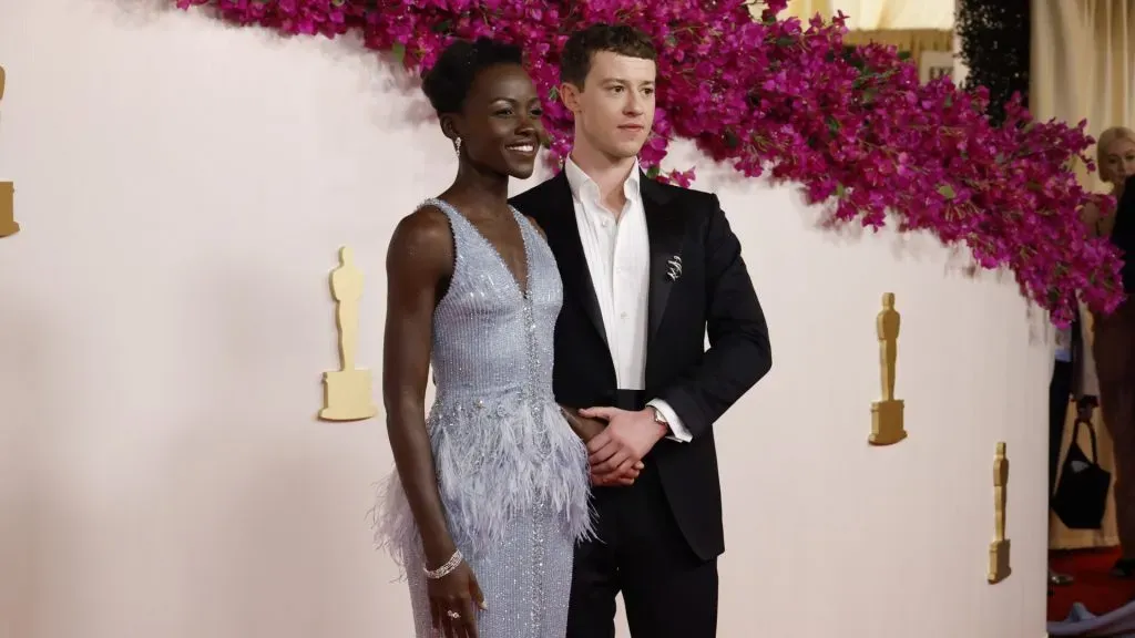 Lupita Nyong’o and Joseph Quinn  attend the 96th Annual Academy Awards on March 10, 2024 in Hollywood, California. (Source: Mike Coppola/Getty Images)