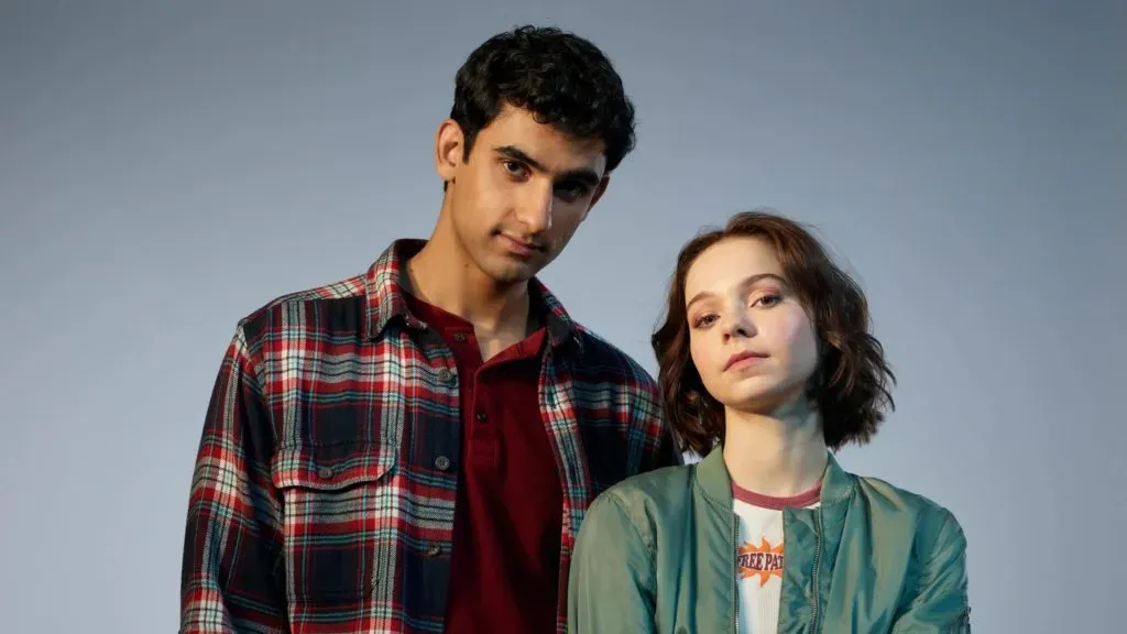Zain Iqbal and Emma Myers pose in promotional photos for “A Good Girl’s Guide to Murder “. (Source: IMDb)