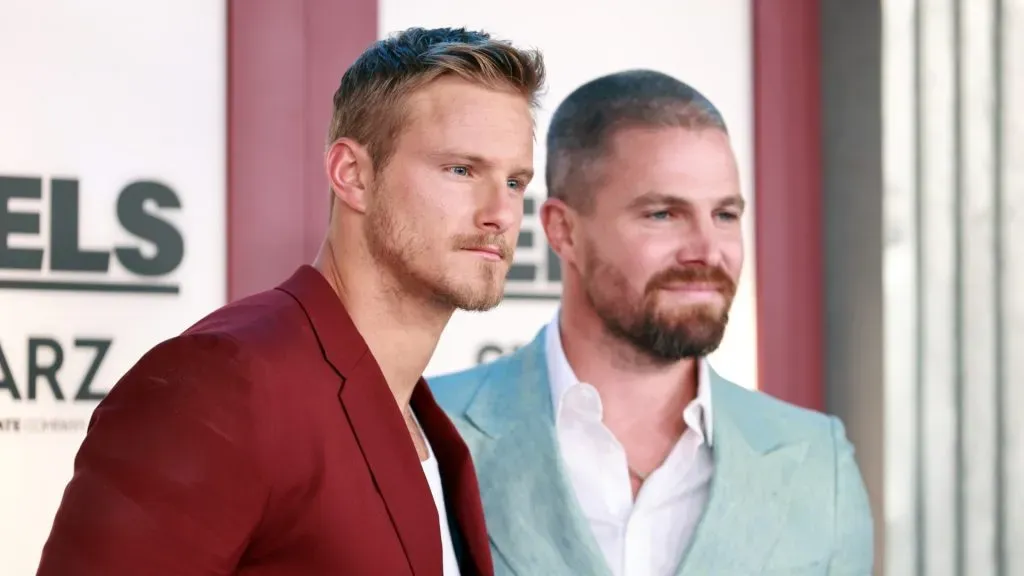 Alexander Ludwig and Stephen Amell are seen as STARZ celebrates the premiere of its new series “Heels” on August 10, 2021 in Los Angeles, California. (Source: Emma McIntyre/Getty Images)