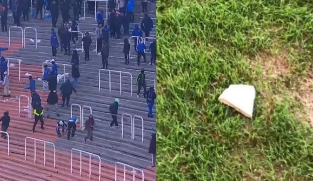 La hinchada de Godoy Cruz arrojó proyectiles hacia el campo de juego.