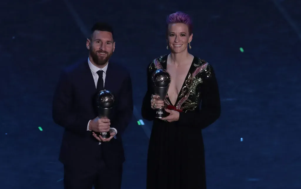 MILAN, ITALY – SEPTEMBER 23:  The Best FIFA Men’s player of the year Lionel Messi and The Best FIFA womenÕs player of the year Megan Rapinoe pose for the photos at the end of The Best FIFA Football Awards 2019 at the Teatro alla Scala on September 23, 2019 in Milan, Italy.  (Photo by Emilio Andreoli/Getty Images)