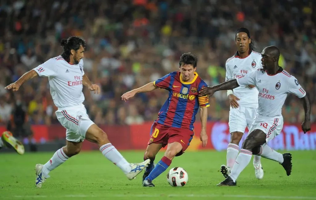 Clarence Seedorf alcanzó a enfrentar a Lionel Messi en sus últimos años en Europa. (Foto: Denis Doyle/Getty Images)
