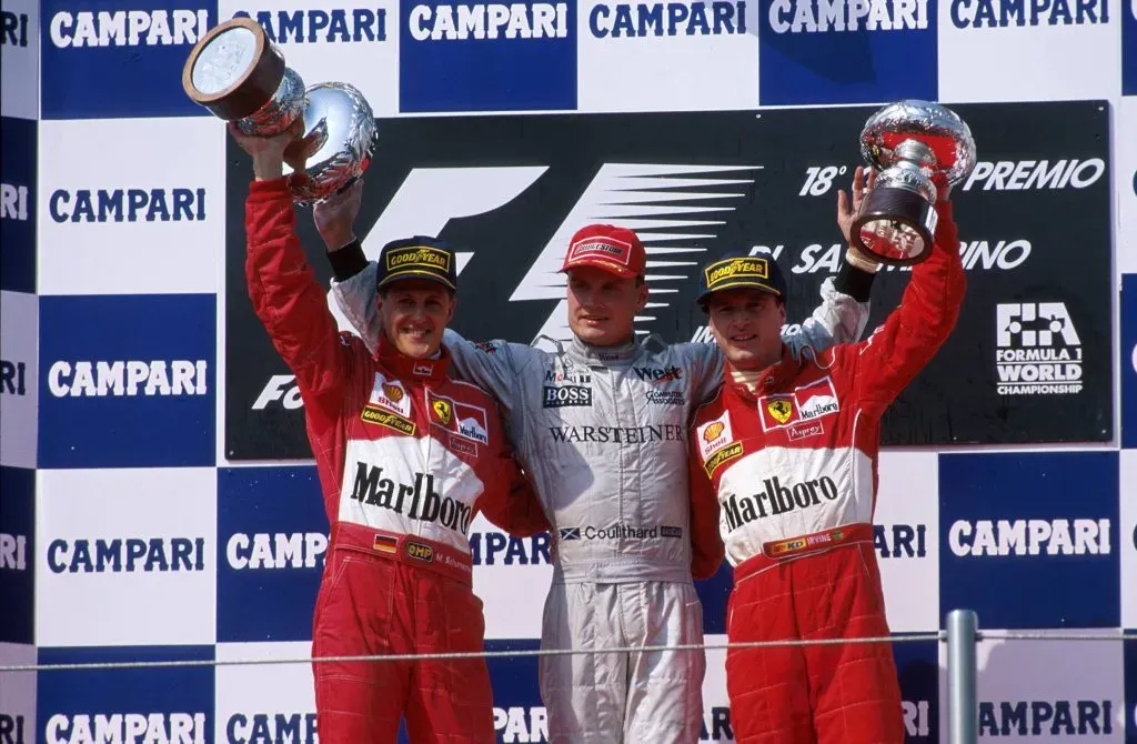 Coulthard, Schumacher, Irvine, el podio en San Marino 1998. IMAGO