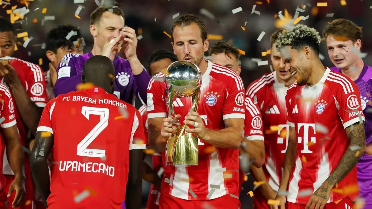 Harry Kane of Bayern Munich lifts the Franz Beckenbauer Supercup Trophy after his team’s victory over VfB Stuttgart on August 16, 2025.