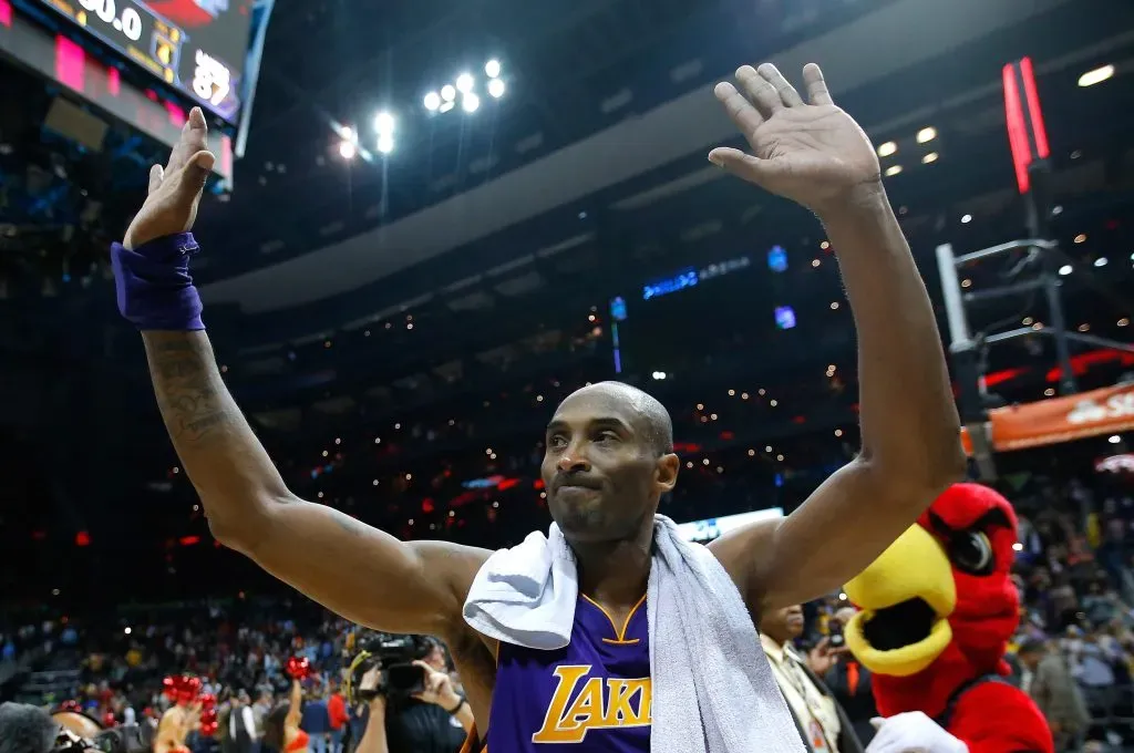 Kobe Bryant #24 of the Los Angeles Lakers waves to the fans after his last game at NBA. Kevin C. Cox/Getty Images