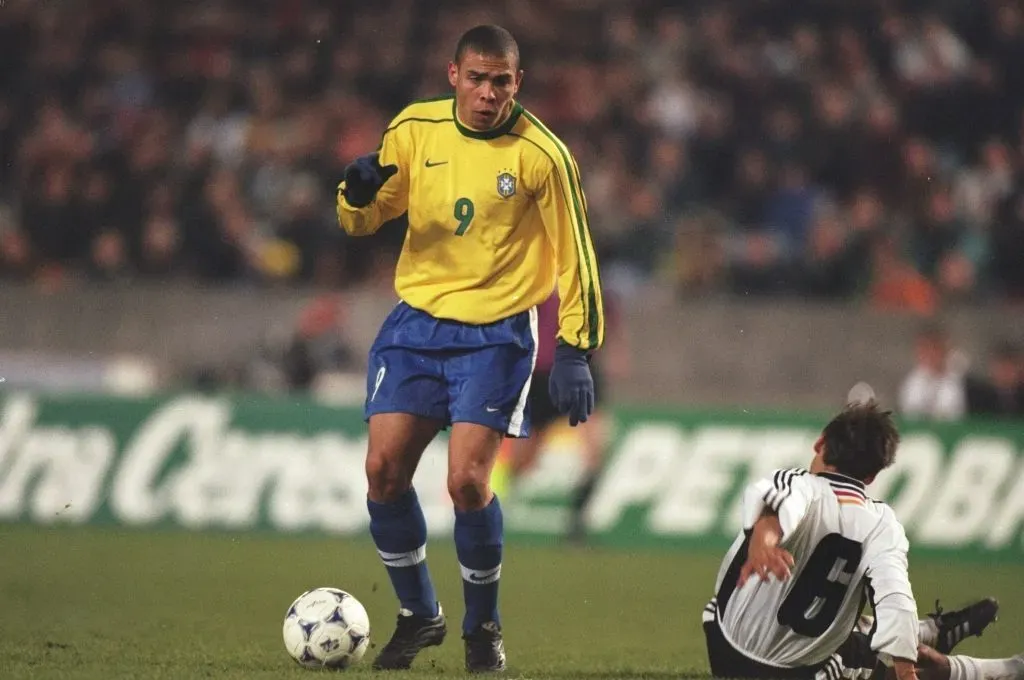 Ronaldo of Brazil (left) is in posession of the ball from Olaf Thon of Germany. Mark Thompson/Allsport