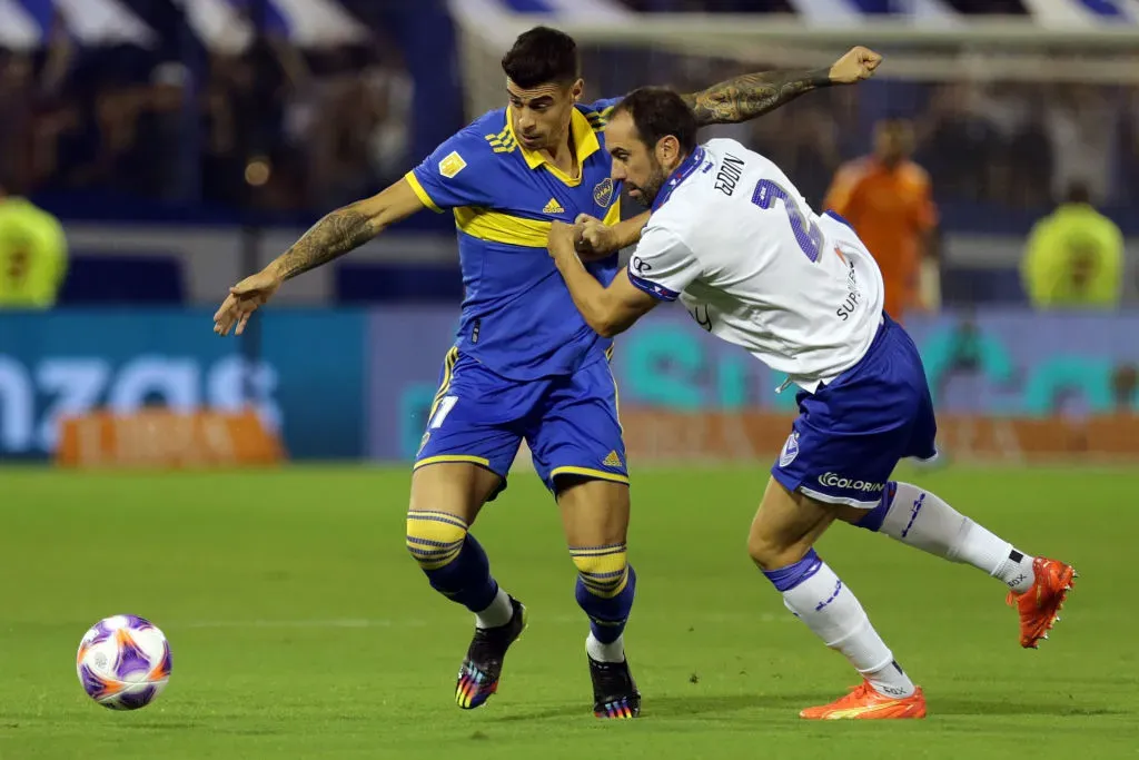 BUENOS AIRES, ARGENTINA – FEBRUARY 25: Martin Payero of Boca Juniors and Diego Godin of Velez Sarsfield vie for the ball during a match between Velez Sarsfield and Boca Juniors as part of Liga Profesional 2023 at Jose Amalfitani Stadium on February 25, 2023 in Buenos Aires, Argentina. (Photo by Daniel Jayo/Getty Images)