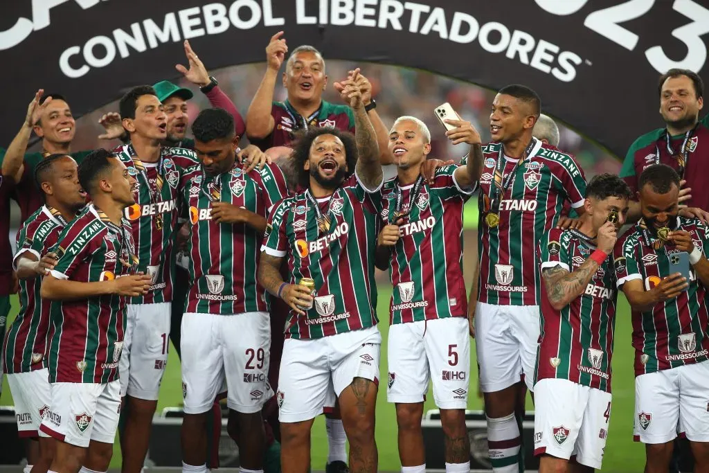 RIO DE JANEIRO, BRAZIL – NOVEMBER 04: Marcelo (C) of Fluminense celebrates with teammates after winning the final match of Copa CONMEBOL Libertadores 2023 between Fluminense and Boca Juniors at Maracana Stadium on November 04, 2023 in Rio de Janeiro, Brazil. (Photo by Raul Sifuentes/Getty Images)