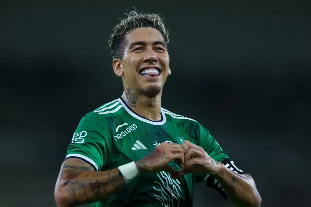 JEDDAH, SAUDI ARABIA – MAY 2: Roberto Firmino of Al Ahli celebrates after scoring the 4th goal during the Saudi Pro League match between Al-Ahli SFC and Damac FC at Prince Abduallah Al Faisal stadium on May 2, 2024 in Jeddah, Saudi Arabia.