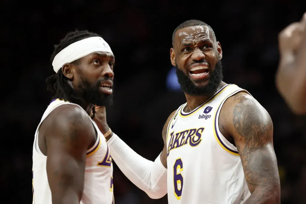 LeBron James #6 and Patrick Beverley #21 of the Los Angeles Lakers react during the third quarter against the Portland Trail Blazers. Steph Chambers/Getty Images