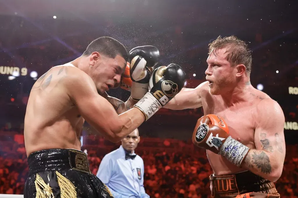 LAS VEGAS, NEVADA – SEPTEMBER 14: WBC/WBA/WBO super middleweight champion Canelo Alvarez (R) punches Edgar Berlanga during the ninth round of a title fight at T-Mobile Arena on September 14, 2024 in Las Vegas, Nevada. (Photo by Steve Marcus/Getty Images)