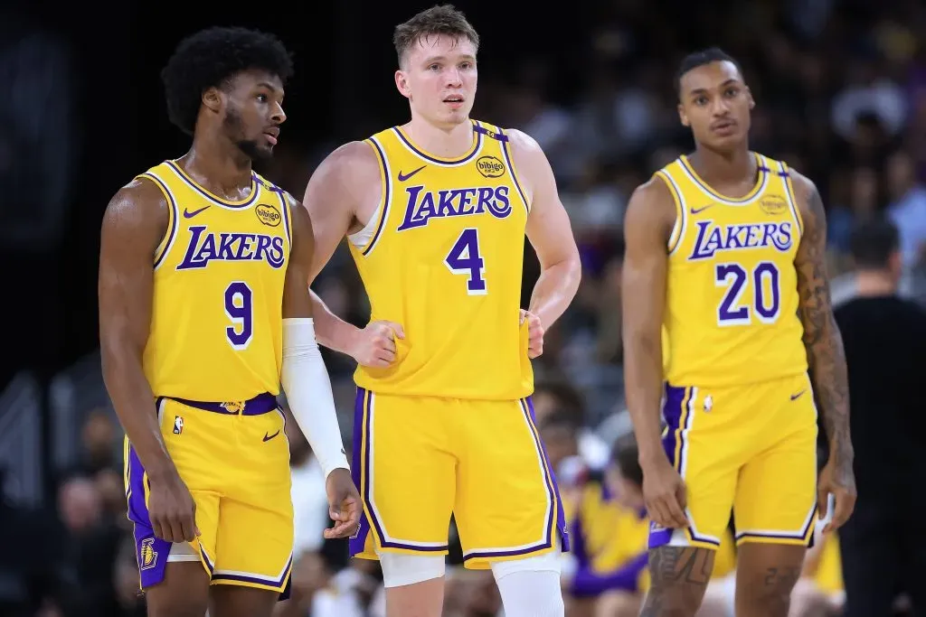 Maxwell Lewis #20, Bronny James #9,  and Dalton Knecht #4 of the Los Angeles Lakers look on during the second half of a game against the Minnesota Timberwolves. Sean M. Haffey/Getty Images