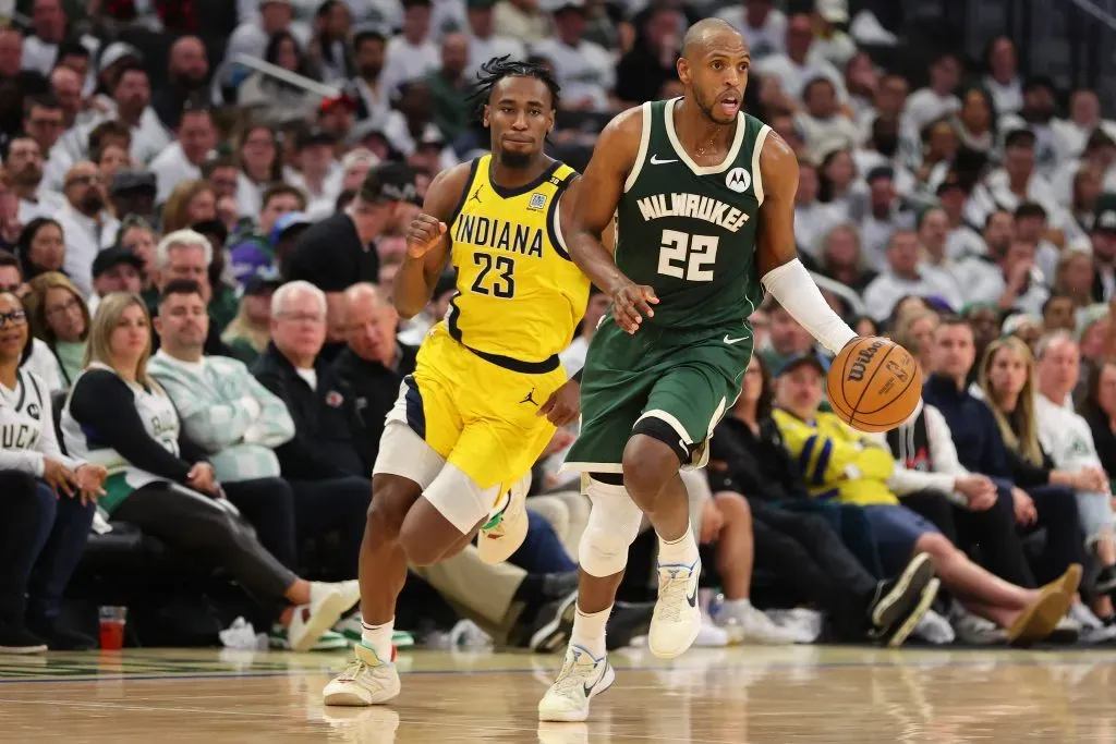 Khris Middleton #22 of the Milwaukee Bucks is defended by Aaron Nesmith #23 of the Indiana Pacers during game two of the Eastern Conference First Round Playoffs. Stacy Revere/Getty Images