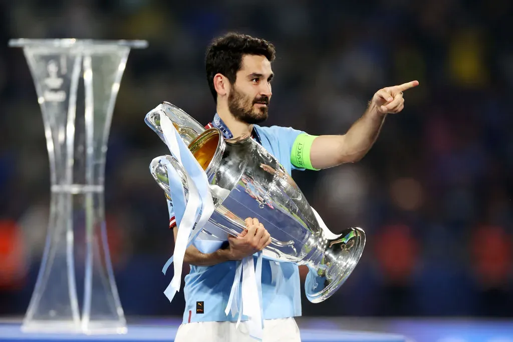 ISTANBUL, TURKEY – JUNE 10: Ilkay Guendogan of Manchester City celebrates with the UEFA Champions League trophy after the team’s victory after the team’s victory in the UEFA Champions League 2022/23 final match between FC Internazionale and Manchester City FC at Ataturk Olympic Stadium on June 10, 2023 in Istanbul, Turkey. (Photo by Michael Steele/Getty Images)