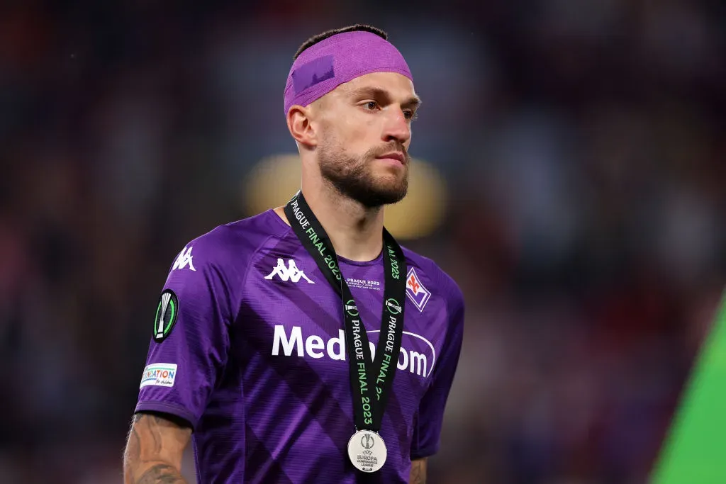 PRAGUE, CZECH REPUBLIC – JUNE 07: Cristiano Biraghi of ACF Fiorentina looks dejected with their runners up medal following the team’s defeat during the UEFA Europa Conference League 2022/23 final match between ACF Fiorentina and West Ham United FC at Eden Arena on June 07, 2023 in Prague, Czech Republic. (Photo by Richard Heathcote/Getty Images)