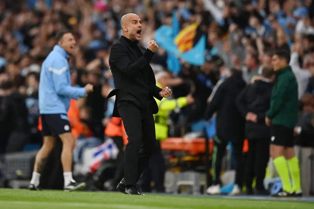 MANCHESTER, ENGLAND – MAY 17: Pep Guardiola, Manager of Manchester City, celebrates their sides first goal during the UEFA Champions League semi-final second leg match between Manchester City FC and Real Madrid at Etihad Stadium on May 17, 2023 in Manchester, England. (Photo by Michael Regan/Getty Images)
