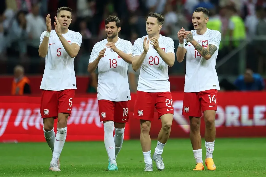 WARSAW, POLAND – JUNE 16: Jan Bednarek, Bartosz Bereszynski, Piotr Zielinski and Jakub Kiwior of Poland applaud fans after the international friendly match between Poland and Germany at Stadion Narodowy on June 16, 2023 in Warsaw, Poland. (Photo by Maja Hitij/Getty Images)