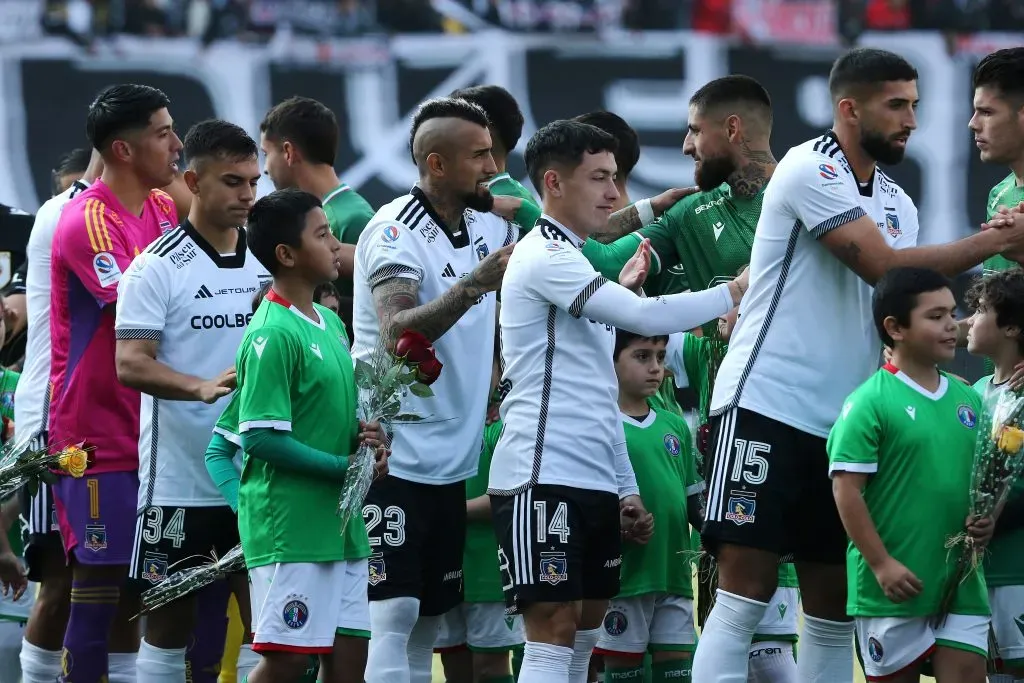 Emiliano Amor y Arturo Vidal en el partido de Colo Colo vs Audax Italiano. (Foto: Photosport)