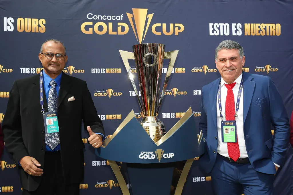 Luis Fernando Suarez (R) of Costa Rica poses with the trophy ahead of the 2023 Concacaf Gold Cup. (Photo by Meg Oliphant/Getty Images)