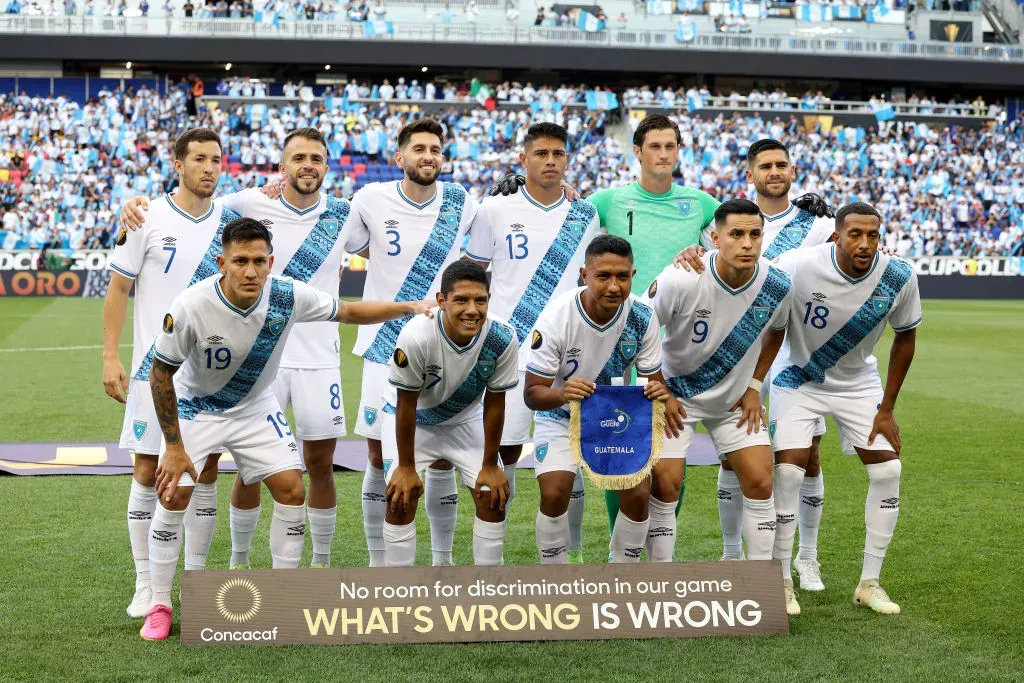 Guatemala starters pose for a team photo before the Group D. (Photo by Elsa/Getty Images)