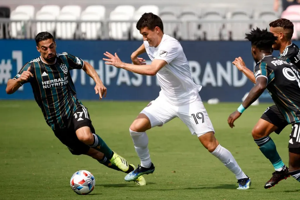 FORT LAUDERDALE, FLORIDA – APRIL 18: Robbie Robinson #19 of Inter Miami FC controls the ball against Sebastian Lletget #17 of Los Angeles Galaxy at DRV PNK Stadium on April 18, 2021 in Fort Lauderdale, Florida. (Photo by Cliff Hawkins/Getty Images)