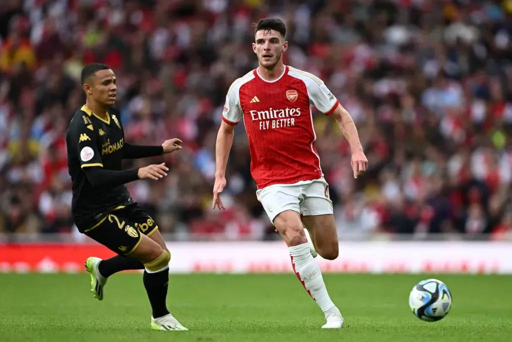 LONDON, ENGLAND – AUGUST 02:  Declan Rice of Arsenal is challenged by Vanderson of AS Monaco during the pre-season friendly match between Arsenal FC and AS Monaco at Emirates Stadium on August 02, 2023 in London, England. (Photo by Mike Hewitt/Getty Images)