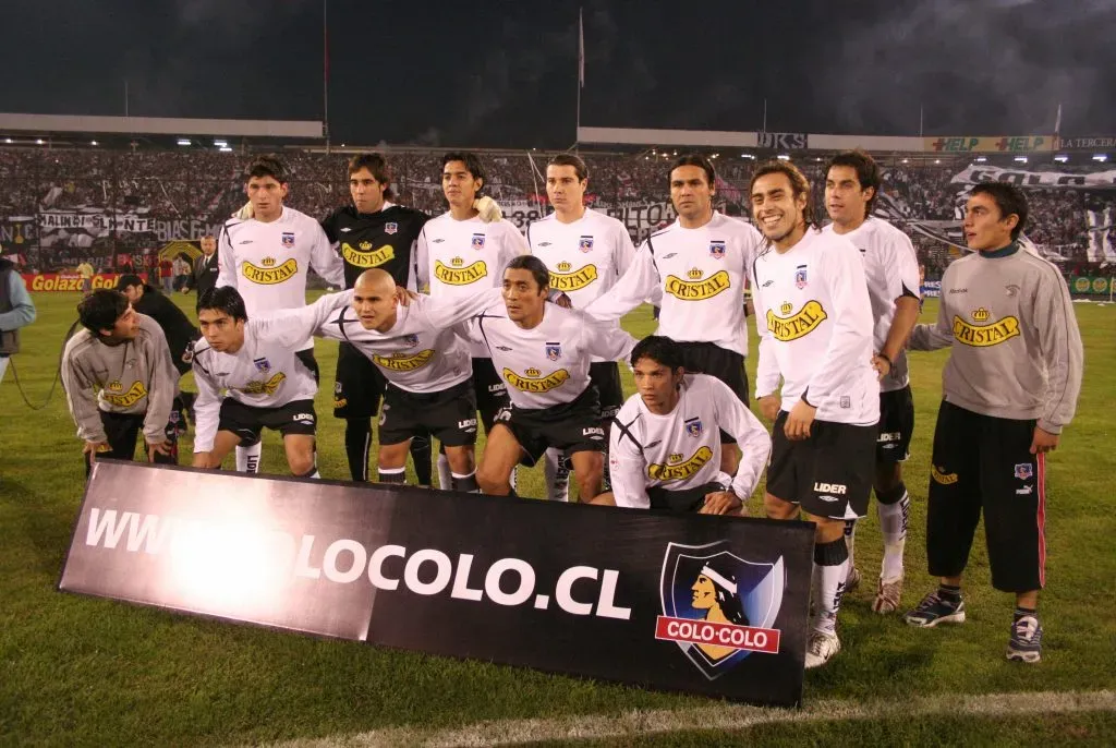 Ayala (a la izquierda de David Henríquez) fue campeón con Colo Colo en el Apertura 2006 | Foto: Photosport