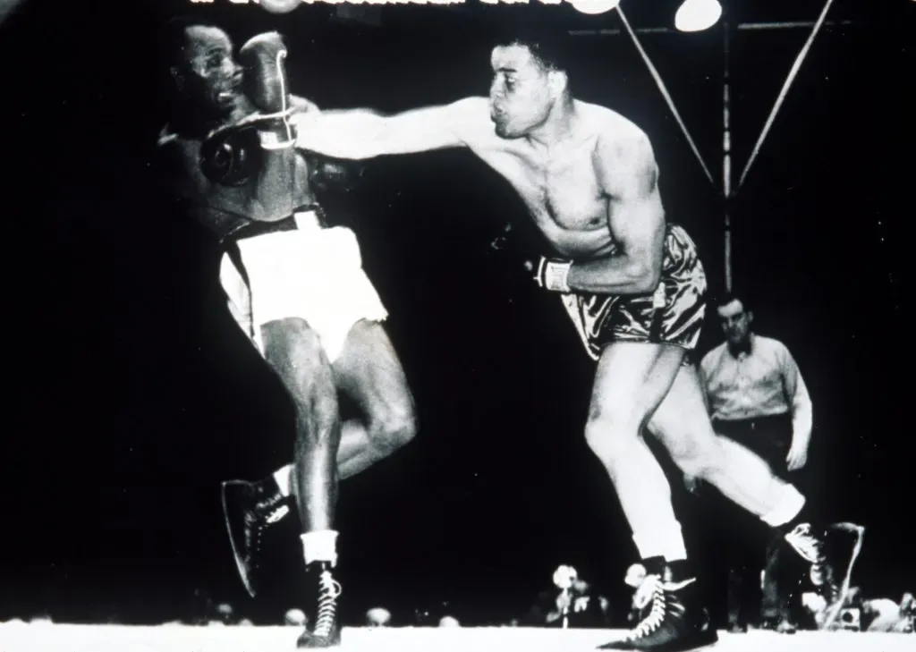 Joe Louis (derecha en la imagen) es el mejor boxeador peso pesado de la historia para George Foreman. (Foto: Allsport UK)